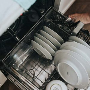 A half-loaded dishwasher